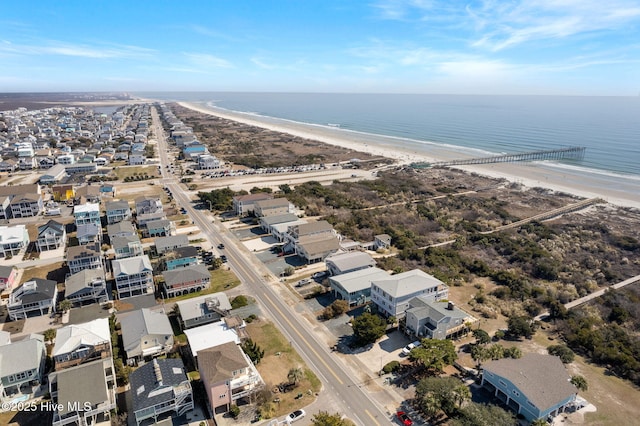 bird's eye view with a beach view and a water view