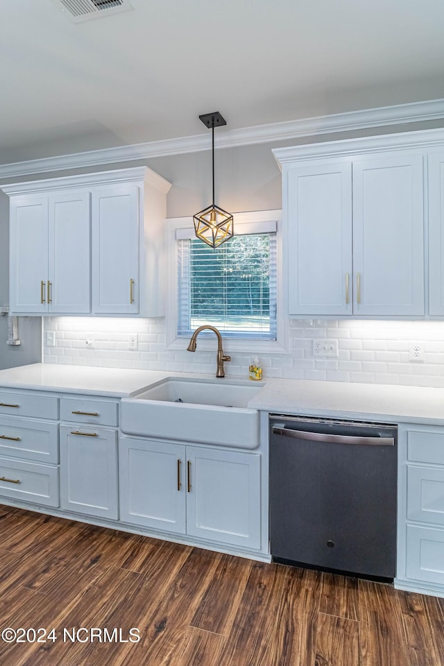 kitchen featuring stainless steel dishwasher, decorative light fixtures, sink, and white cabinets