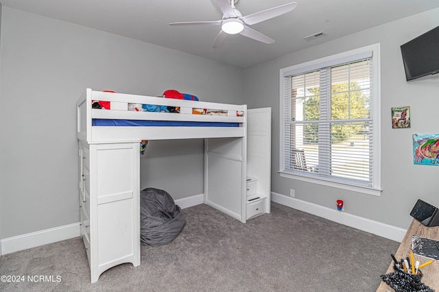 carpeted bedroom featuring ceiling fan