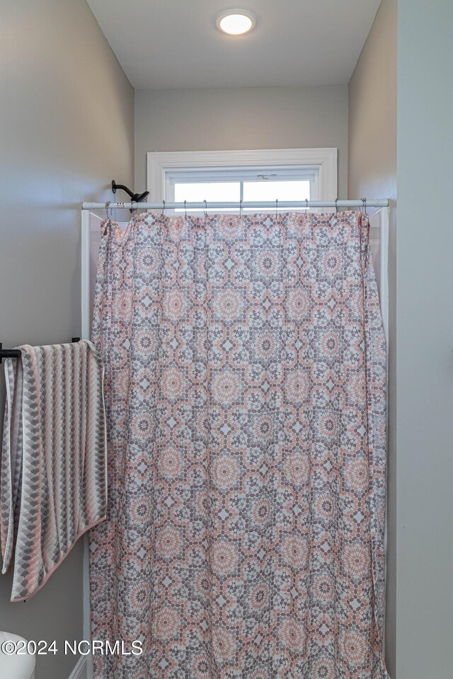 bathroom with walk in shower