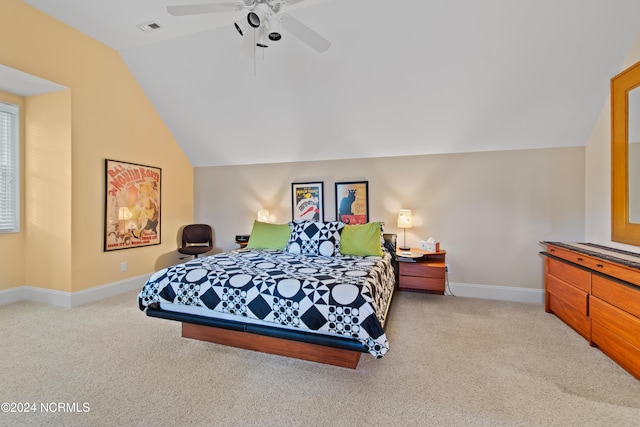 bedroom with lofted ceiling, light colored carpet, and ceiling fan