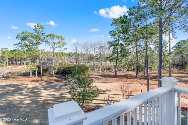 view of yard featuring a balcony