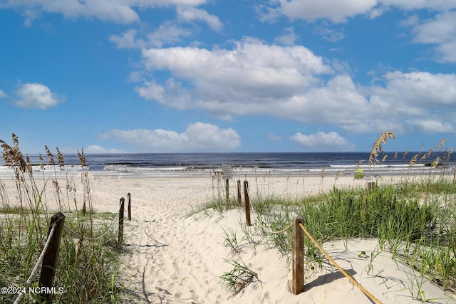 1000 Caswell Beach Rd Unit 1111, Oak Island, NC 28465 - water view featuring nearby beach