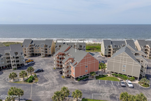 aerial view with a view of the beach and a water view