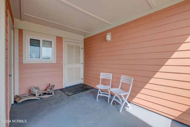 property entrance featuring a patio