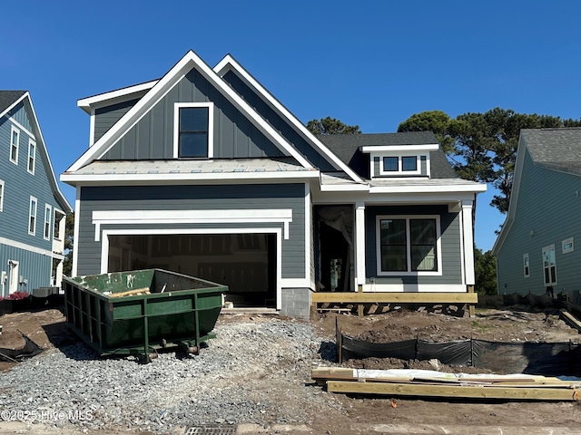 187 Spicer Lake Dr, Holly Ridge, NC 28445 - view of front of property with board and batten siding