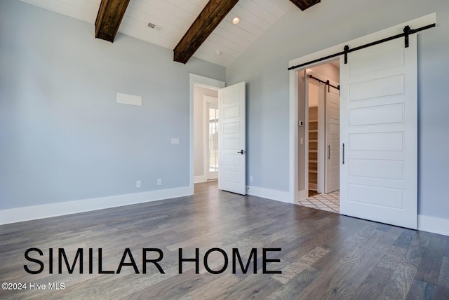 unfurnished bedroom with a barn door, wooden ceiling, wood-type flooring, and lofted ceiling with beams