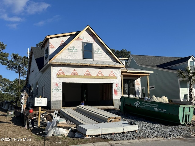 187 Spicer Lake Dr, Holly Ridge, NC 28445 - property in mid-construction featuring a garage