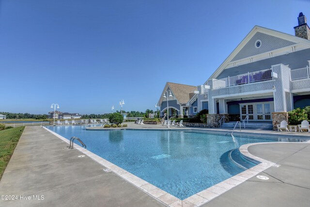 pool featuring a patio area