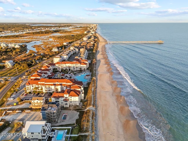 bird's eye view with a view of the beach and a water view