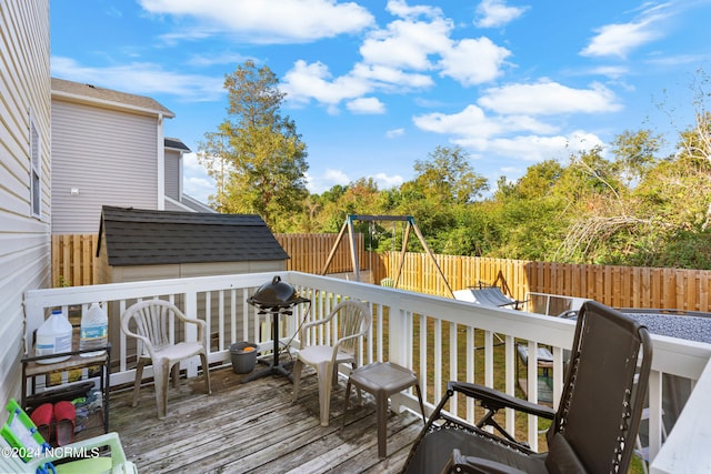 deck with a storage shed