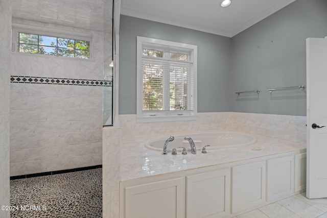 bathroom with tile patterned flooring, shower with separate bathtub, plenty of natural light, and ornamental molding