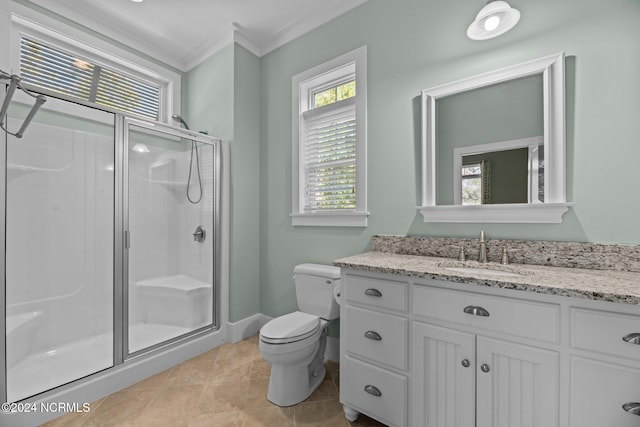 bathroom featuring tile patterned floors, crown molding, an enclosed shower, toilet, and vanity