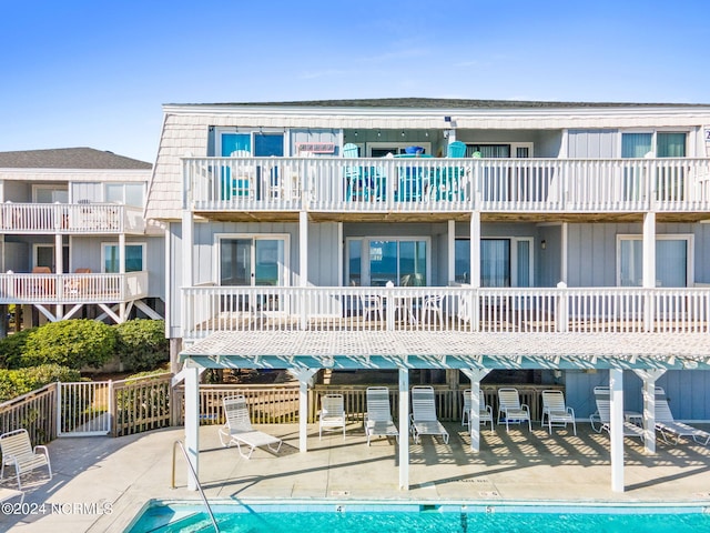 view of property with a community pool