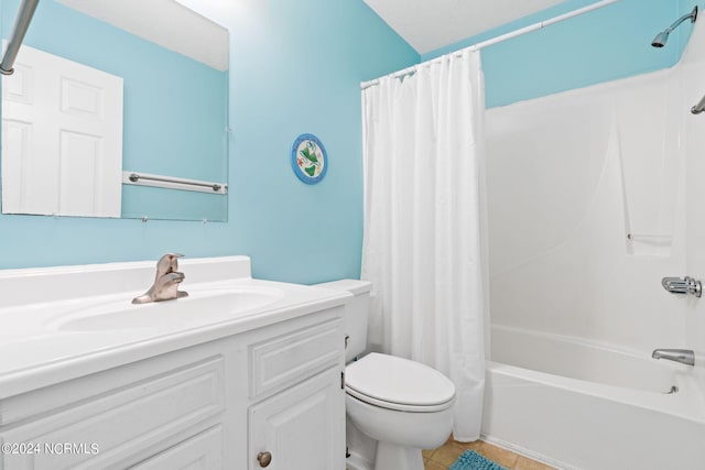 full bathroom with vanity, shower / bath combo, toilet, and tile patterned flooring