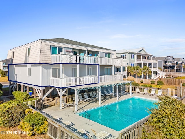 view of swimming pool with a patio area