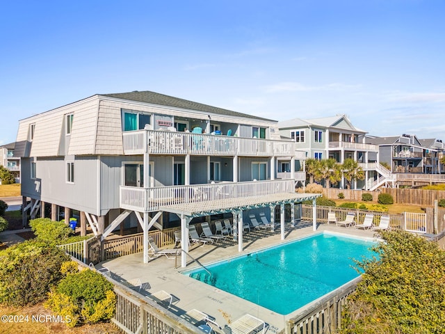 view of swimming pool with a patio