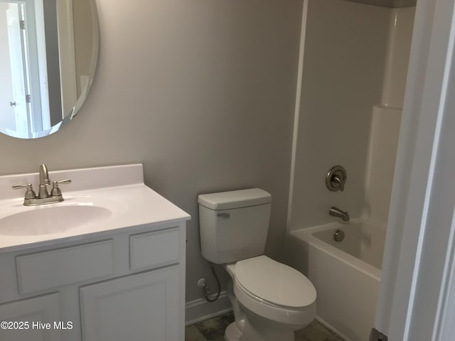 full bathroom with vanity, toilet, and washtub / shower combination