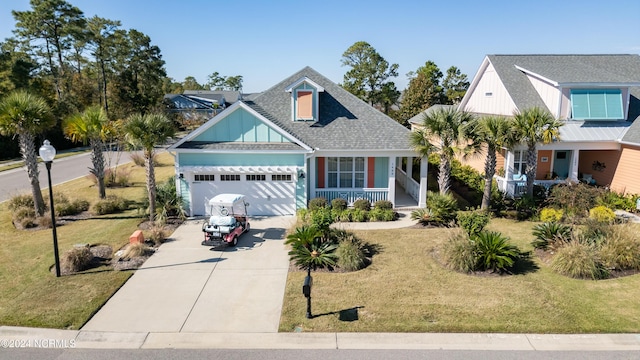 view of front of house featuring a front lawn, a porch, board and batten siding, concrete driveway, and an attached garage