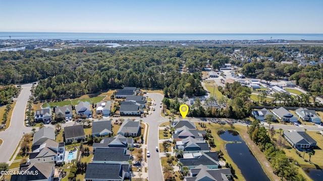 aerial view featuring a residential view and a water view