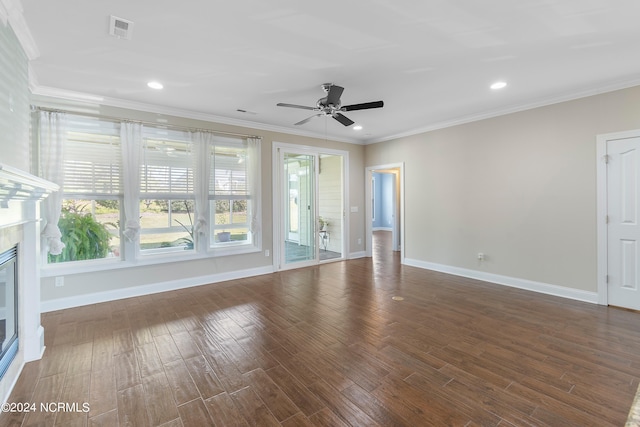 unfurnished living room with ornamental molding, dark wood-type flooring, and ceiling fan