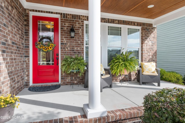 property entrance featuring covered porch