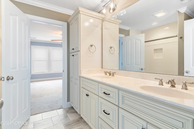 bathroom featuring vanity, ornamental molding, and tile patterned floors