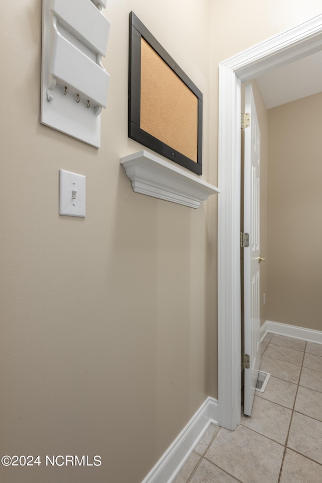 bathroom with tile patterned flooring