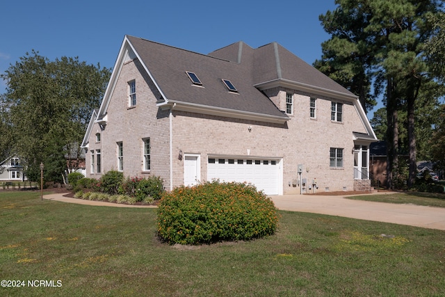 view of home's exterior featuring a yard and a garage