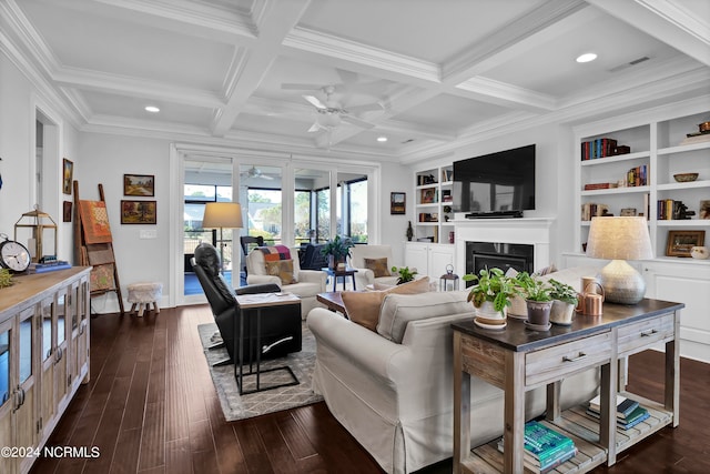 living room featuring dark hardwood / wood-style flooring, ceiling fan, coffered ceiling, beam ceiling, and ornamental molding