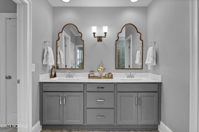 4422 Old Towne St, Wilmington, NC 28412 - full bathroom featuring baseboards, a sink, and double vanity