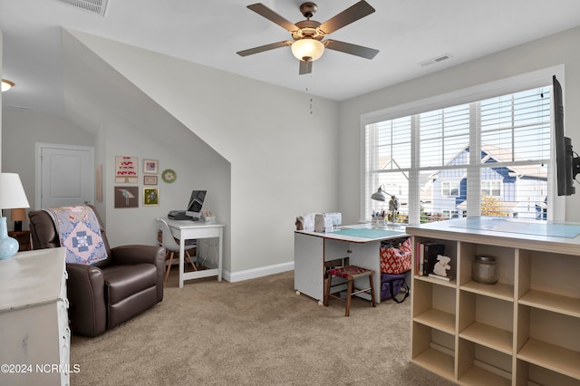 carpeted office space with ceiling fan