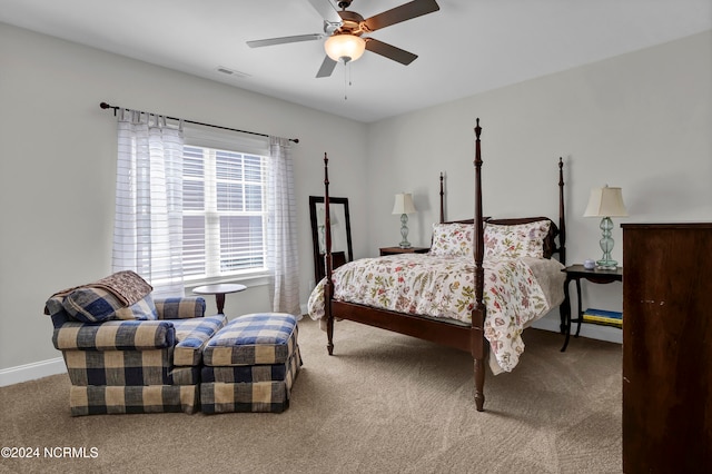 bedroom with ceiling fan and carpet flooring