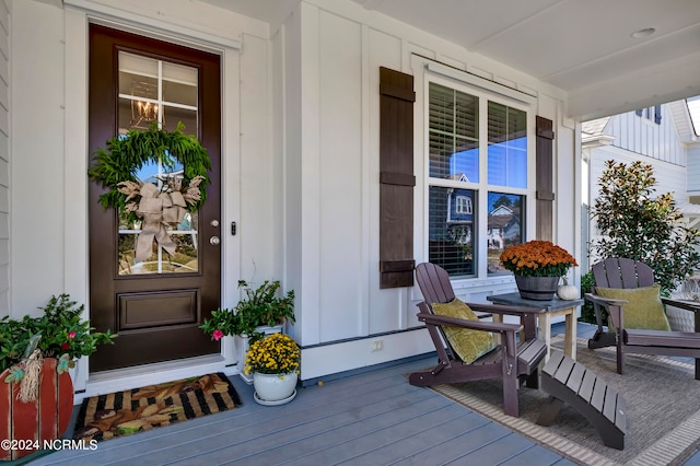 entrance to property with covered porch