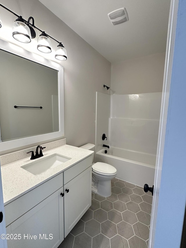 3965 Pepperberry Ln, Southport, NC 28461 - full bathroom featuring vanity, tile patterned floors, and washtub / shower combination