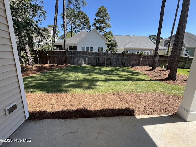 3965 Pepperberry Ln, Southport, NC 28461 - view of yard featuring a patio and a residential view
