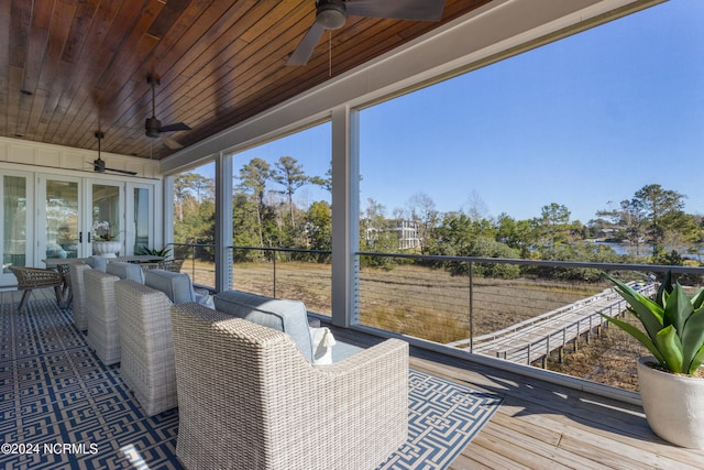 deck featuring an outdoor hangout area and ceiling fan