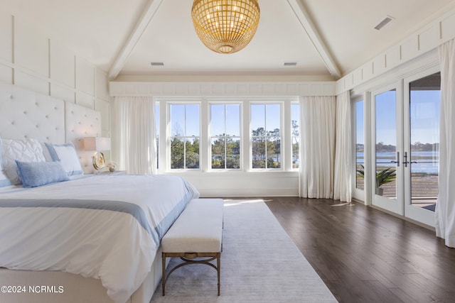 bedroom featuring french doors, access to outside, lofted ceiling, and dark hardwood / wood-style floors