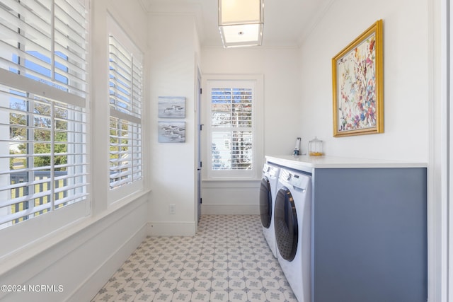 washroom featuring crown molding and separate washer and dryer