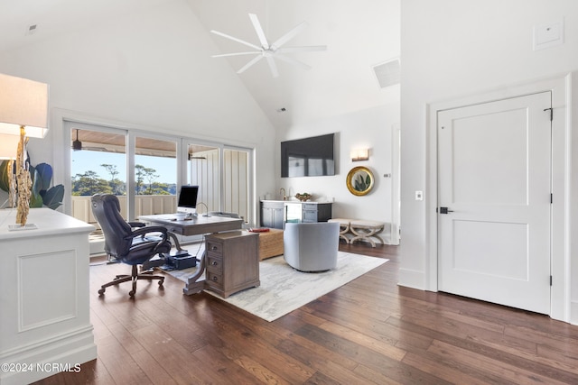 office area with dark wood-type flooring, high vaulted ceiling, and ceiling fan