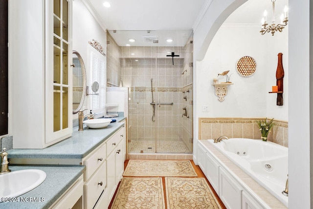 bathroom with plus walk in shower, tile patterned floors, vanity, crown molding, and a notable chandelier