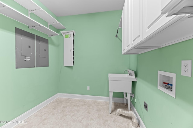 washroom featuring hookup for a washing machine, light carpet, hookup for an electric dryer, cabinets, and electric panel