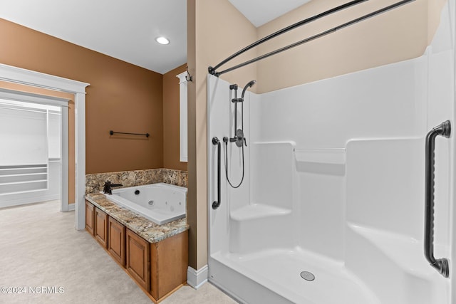 bathroom with separate shower and tub