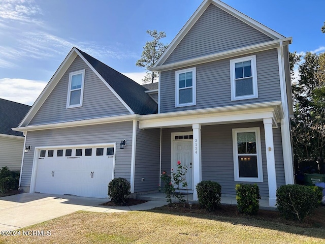 view of property with a porch, a front lawn, and a garage