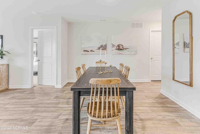 dining room featuring light wood-type flooring