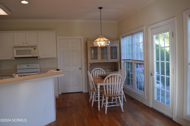 kitchen with dark wood-type flooring, white cabinetry, and white appliances