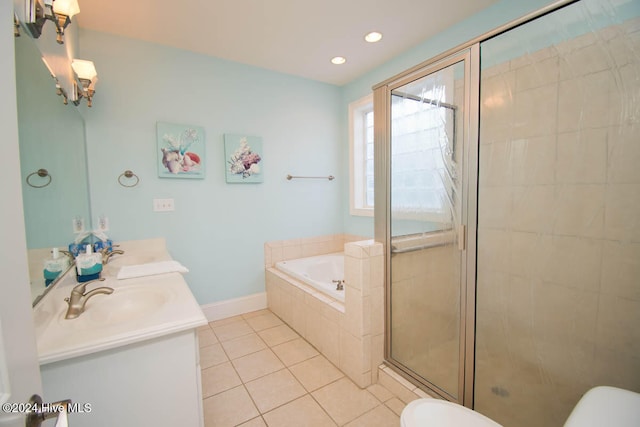 full bathroom with vanity, toilet, tile patterned floors, and shower with separate bathtub