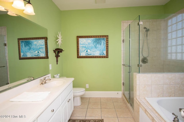 full bathroom featuring vanity, toilet, shower with separate bathtub, and tile patterned flooring