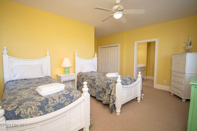 bedroom featuring a closet, ceiling fan, and carpet