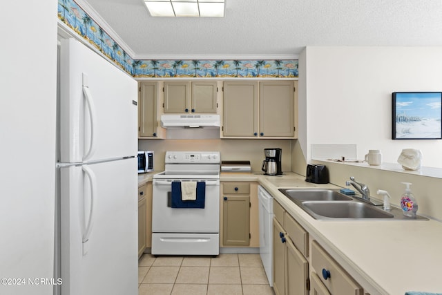 kitchen featuring sink, a textured ceiling, white appliances, and light tile patterned floors